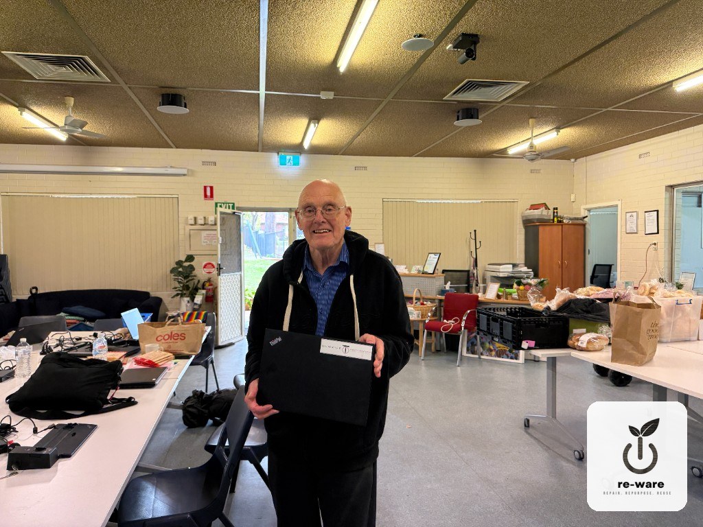 A Grandcarers WA community member with their refurbished Re-Ware laptop