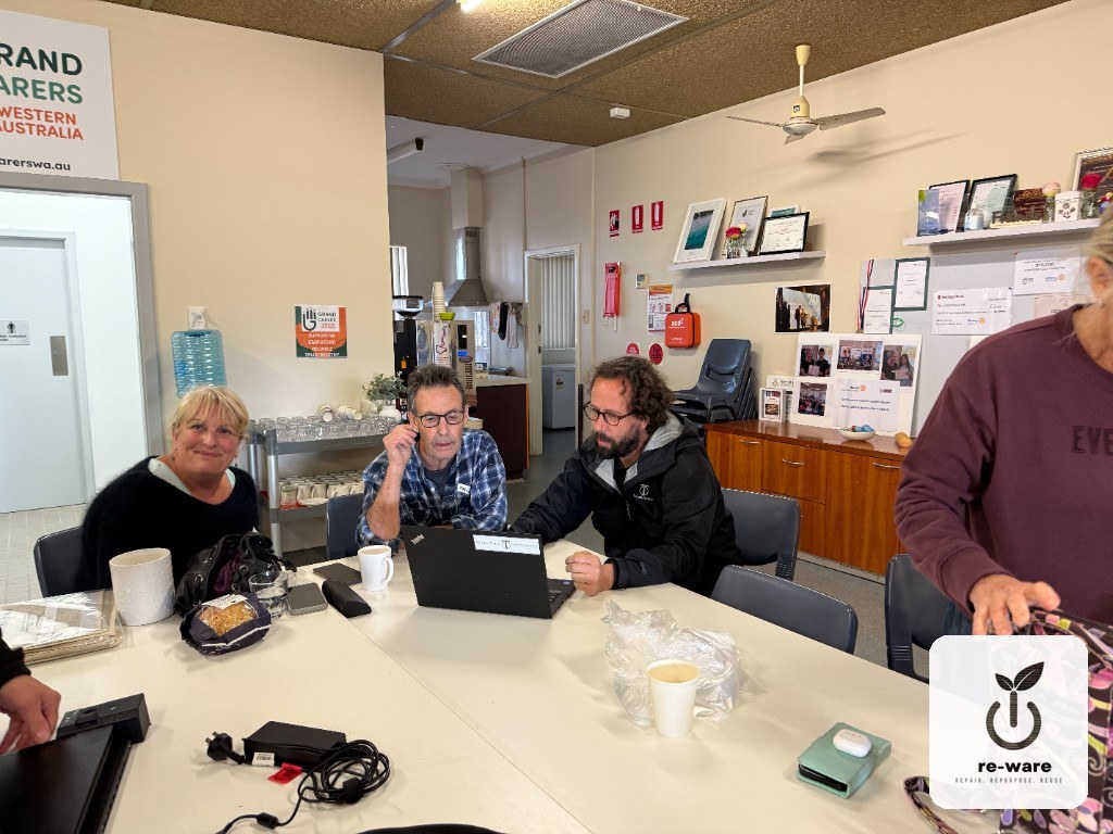 Setting up refurbished laptops with the community at Grandcarers WA